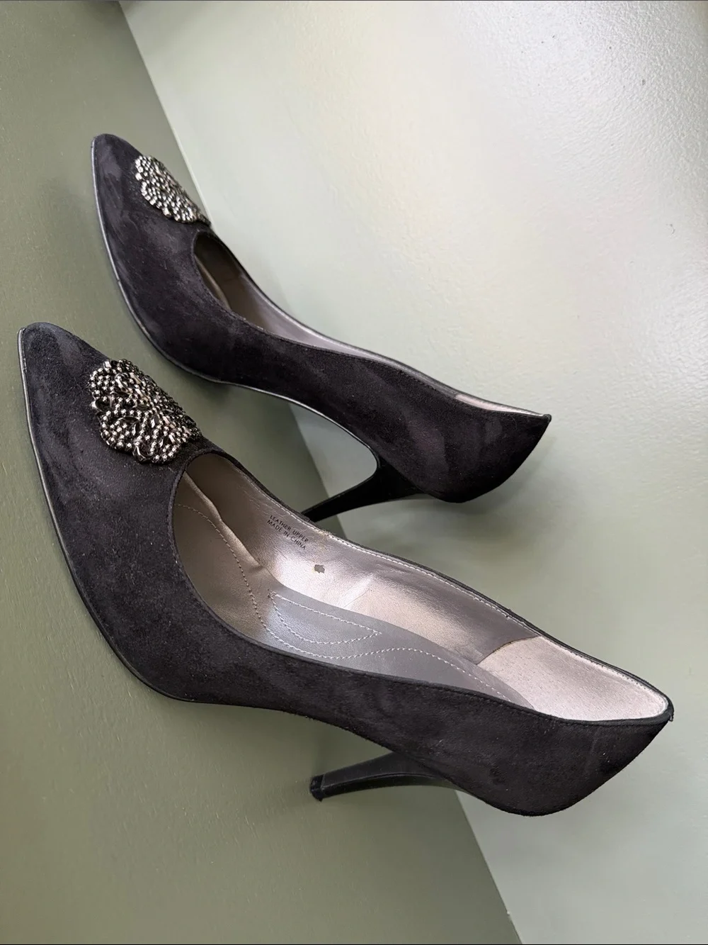 Tahari Black Pointed-Toe Heels with Metallic Brooch Detail